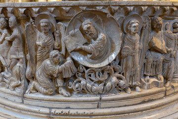 Romanesque marble baptismal font with high relief biblical scenes and domed cover, 12th century,...