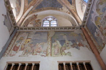 Fragmentary frescoes in the transept of Basilica of Saint Clare, Assisi, Italy, showing narrative...