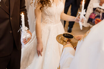 Orthodox Wedding Ceremony with Candles and Holy Water: Traditional Christian Ritual, Bride and...