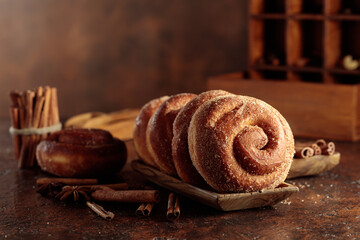 Swedish cinnamon rolls on a brown background.