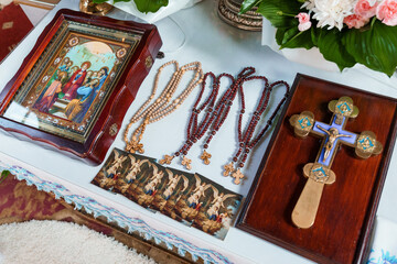 Orthodox Christian Prayer Set: Icon, Rosary Beads, and Cross on White Table, Religious Devotion...