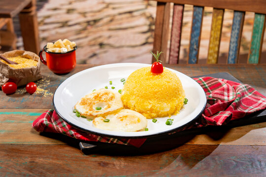 couscous sttufed with cheese with eggs in a beautiful countryside city setting ( cuzcuz )