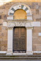 Romanesque portal with sculpted architrave depicting biblical scene, attributed to Biduino, Church...