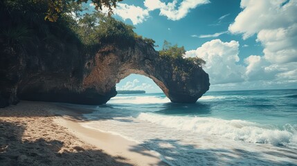 Dramatic Coastal Archway with Lush Vegetation and Turquoise Waters Under a Sunny Sky