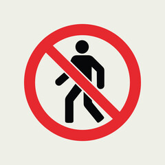 No pedestrians allowed sign with black silhouette of a person