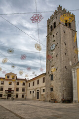 Motovun church and bell tower with festive decorations, Croatia