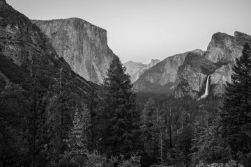 Black and white photo of amazing view of Yosemite Valley from viewpoint Tunnel View in Yosemite national park, California