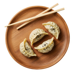 Steamed Dumplings with Black Sesame Seeds on Wooden Plate