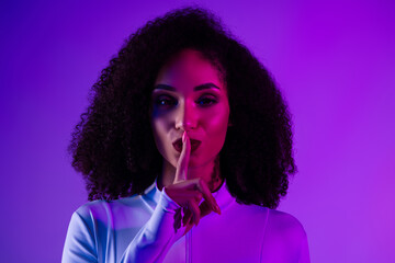 Portrait of a fashionable woman in neon light showcasing elegance, allure, beauty, and stylish...