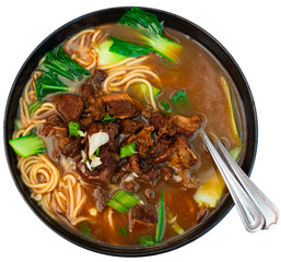 Beef soup with rich broth, spices and pepper. Hot Chinese noodle soup. Isolated over white background