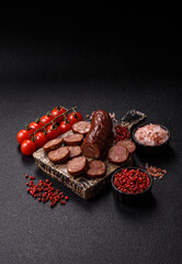 Homemade meat or vegan sausage grilled with spices. Homemade sausage cooked on barbecue