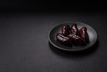 Blood sausage, pudding, meat food with lard and spices. Blood sausage
