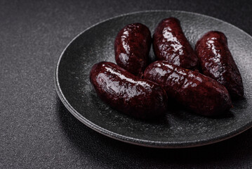 Blood sausage, pudding, meat food with lard and spices. Blood sausage