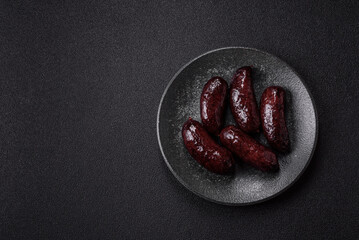 Blood sausage, pudding, meat food with lard and spices. Blood sausage