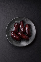 Blood sausage, pudding, meat food with lard and spices. Blood sausage