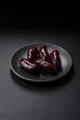 Blood sausage, pudding, meat food with lard and spices. Blood sausage