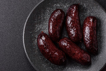 Blood sausage, pudding, meat food with lard and spices. Blood sausage