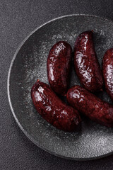 Blood sausage, pudding, meat food with lard and spices. Blood sausage