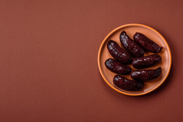 Blood sausage, pudding, meat food with lard and spices. Blood sausage