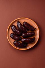 Blood sausage, pudding, meat food with lard and spices. Blood sausage