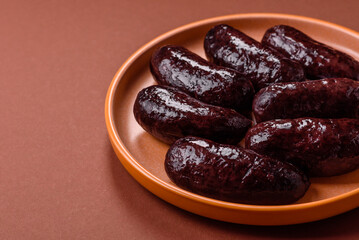 Blood sausage, pudding, meat food with lard and spices. Blood sausage
