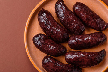 Blood sausage, pudding, meat food with lard and spices. Blood sausage