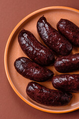 Blood sausage, pudding, meat food with lard and spices. Blood sausage