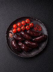 Blood sausage, pudding, meat food with lard and spices. Blood sausage