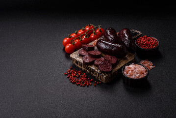 Blood sausage, pudding, meat food with lard and spices. Blood sausage