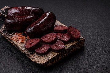 Blood sausage, pudding, meat food with lard and spices. Blood sausage