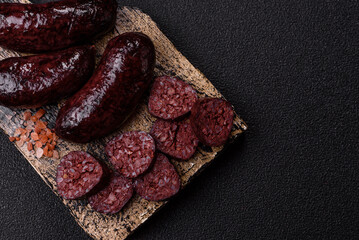 Blood sausage, pudding, meat food with lard and spices. Blood sausage