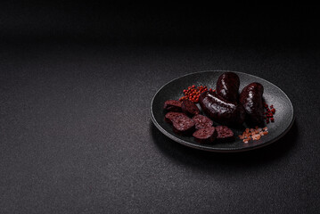 Blood sausage, pudding, meat food with lard and spices. Blood sausage