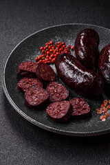 Blood sausage, pudding, meat food with lard and spices. Blood sausage