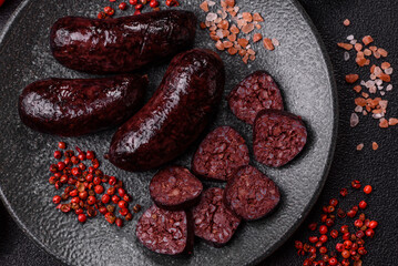 Blood sausage, pudding, meat food with lard and spices. Blood sausage