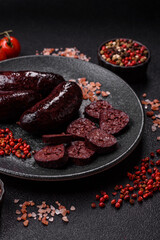 Blood sausage, pudding, meat food with lard and spices. Blood sausage