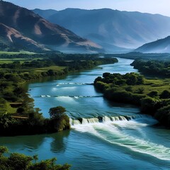 a beautiful natural landscape, with a river flowing swiftly through a lush green valley. In the background, towering mountains, shrouded in mist, add to the cool and serene atmosphere