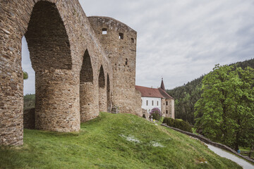 This historic Gothic bridge connects to Velhartice Castle, surrounded by verdant hills. Visitors...