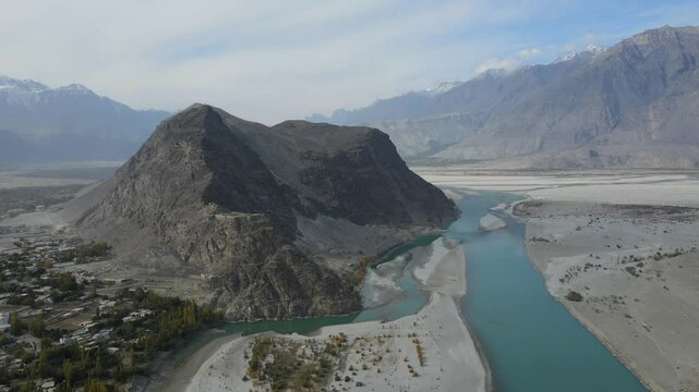 Aerial view of Indus River winding through mountains, Pakistan.