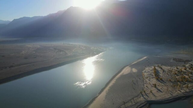 Aerial view of the Indus River winding through mountains, Pakistan.