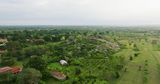 Aerial view of serene countryside and rock formations, Uganda.