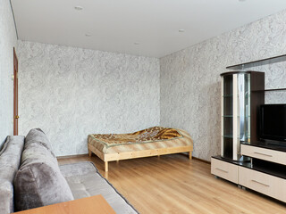 interior design. interior photography of an apartment for rent. One-room apartment with a simple...