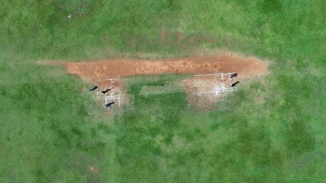 Aerial view of cricket pitch and green grass, Sri Lanka.