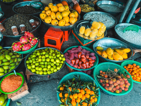 Fruits on display in the marketplace. Chợ Xóm Mới, Nha Trang, Vietnam - Powered by Adobe