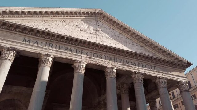 The pantheons magnificent facade stands tall in the heart of rome