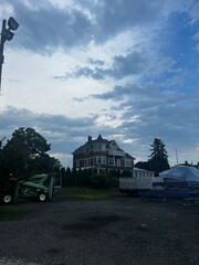 house on the hill in the calm before the storm