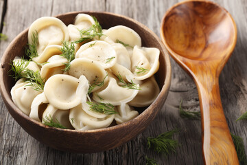 Traditional Russian delicacies - Pelmeni. A mixture of ground beef, lamb and chicken, wrapped in an envelope of unleavened dough.