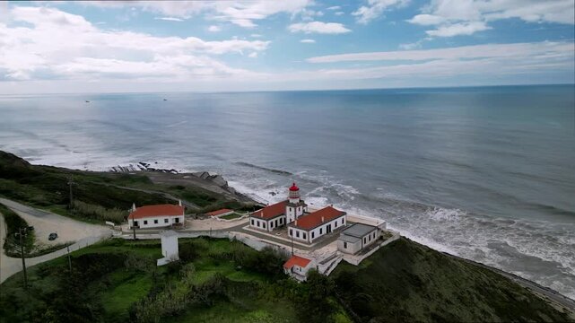Aerial view of Farol do Cabo Mondego lighthouse, Portugal.