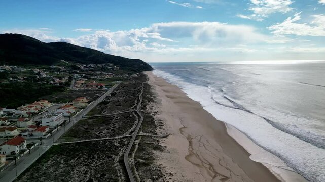Aerial view of Praia da Tocha beach with ocean, Portugal.