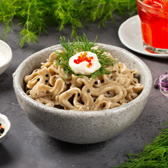 Russian food delicacies - Yakut stroganina. Thinly sliced ​​strips of frozen sturgeon fish, eaten raw, often with salt and pepper