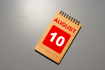 Wooden block calendar with the date August 10